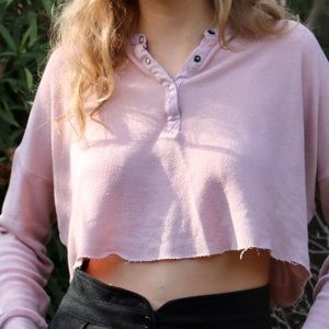 Pink slightly cropped shirt